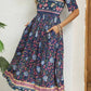 Vestido Boho Midi Estampado Floral Cuello Redondo Manga Corta Con Bolsillos