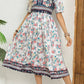 Vestido Boho Midi Estampado Floral Cuello Redondo Manga Corta Con Bolsillos